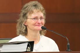 Deb on witness stand